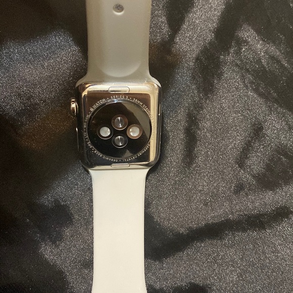 Apple Watch (Series 3) 2017 38 mm - Stainless steel with grey rubber sport band